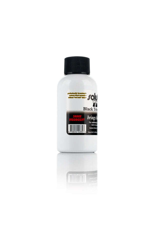 The side of a bottle of Solution Finish on a white background.