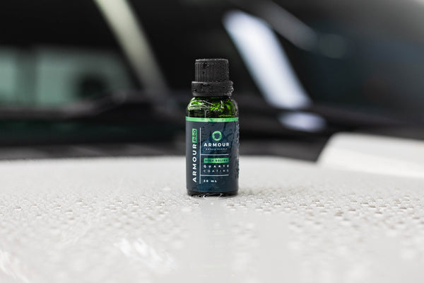Armour Detail Supply Quartz Pro 30ml Bottle on top of a white vehicle.