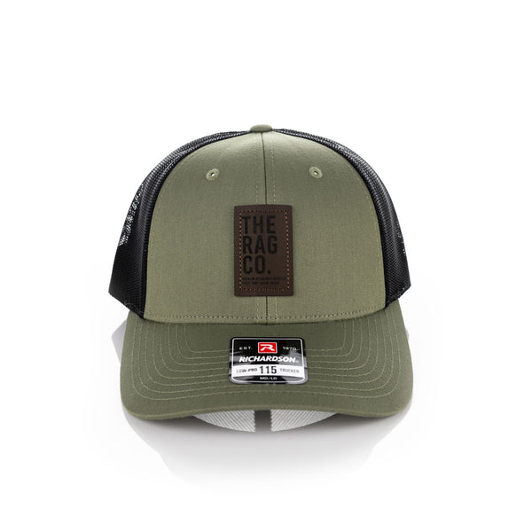 A green TRC hat on a white background.