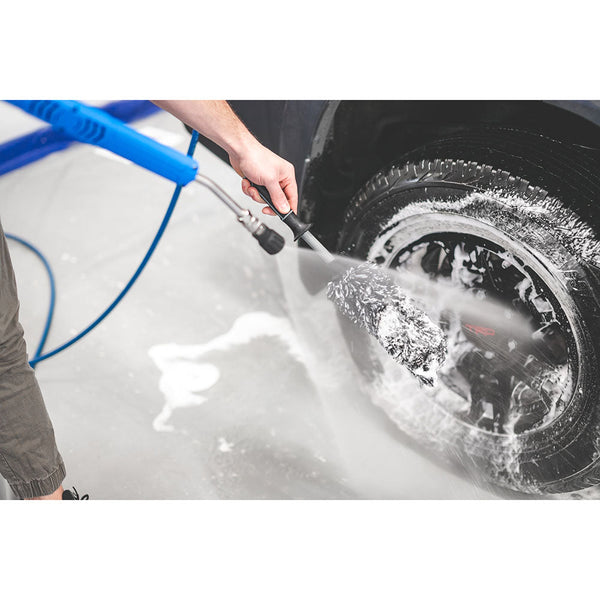 Detail Factory Grey Wheel Brush Demo Cleaning off the brush with a power washer