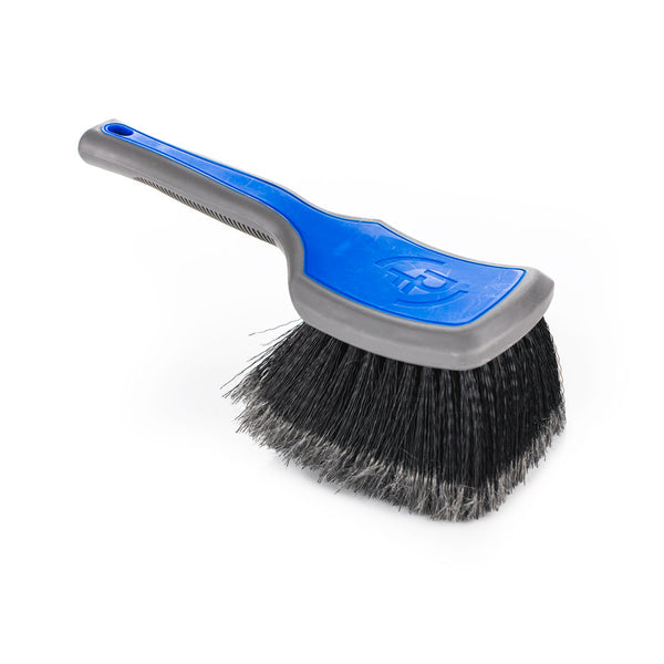 Detail Factory Wheel Face Brush Avalanche handle view on a white background.