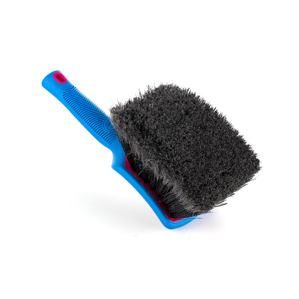 A pink Detail Factory Wheel Face Brush on a white background.