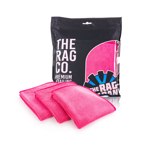 Premium FTW 16 x 16 Pink 3 Pack of towels with packaging on a white background.