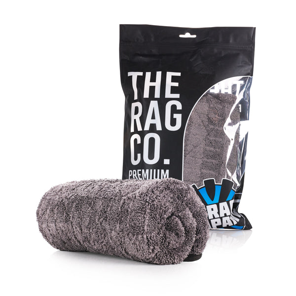 TRC The Gauntlet 20x30 rolled towel on a white background with packaging.