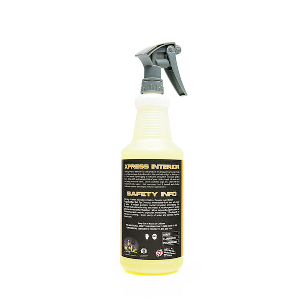The back of a spray bottle of P & S Xpress Interior on a white abckground.