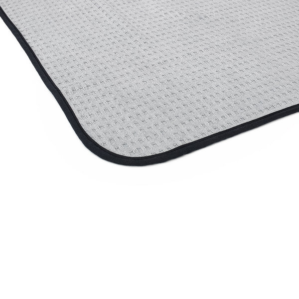 The corner of the big one towel on a white background.