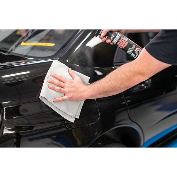 The Rag Company Edgeless Pearl Towel cleaning a vehicle.
