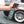 Armour Detail Iron 16oz bottle with a grey car in the background. 