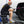 Person cleaning a white Toyota Tundra truck with a Detail Fender Well Brush underglow. 