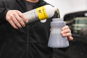 Koch-Chemie Active Foam 1 Liter being poured into foam gun.