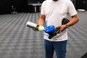 Koch-Chemie p1.03 Lack Polish Grun poring on a blue polishing sponge attached to a Rupes polisher. 