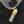 Koch-Chemie Rapid Rinseless Wash 1 Liter bottle laid next to a bucket of water with a black sponge. 