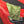 Green M22 laying folded on top of a red car.