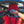 Person cleaning a red car seat with a blue edgeless 300.