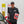 Person holding a spray bottle and jug of P&S Triple S