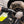 Person spraying a spray bottle filled with P&S Undressed onto a Detail Factory Wheel Brush.
