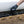 Person cleaning a car step with a Detail Factory Curveball.