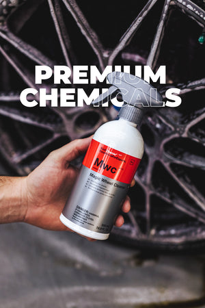 A person holding Magic Wheel Cleaner with the text "Premium Chemical Collection"