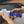 Terry Sponge 2 x 4 Blue with Gtechniq Metal Restoration Polish being poured onto it.