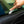 A person using a Yellotools YelloFlex Shape on a car window.