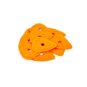 A pile of orange Yel-Lo-Pleks on a white background.