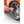 A person spraying a car tire rim with P & S Paint Gloss.