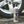 P&S Shine All Performance Dressing 16oz bottle view in front of a tire.