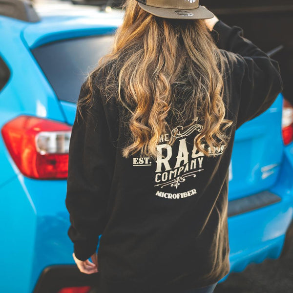 The Rag Company Whiskey hoodie back view with a person wearing the hoodie. 